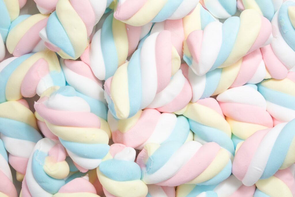 Pastel Marshmallows Spiral Design Wallpaper Background for Sweet Decor