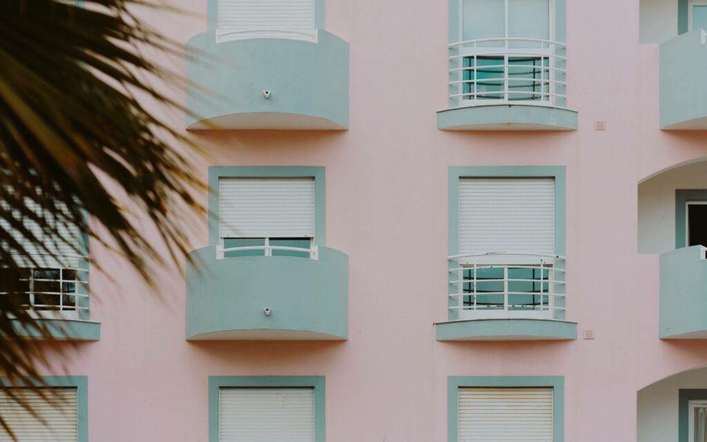 Minimalist Pastel Balconies Wallpaper with Dreamy Palm Tree Background