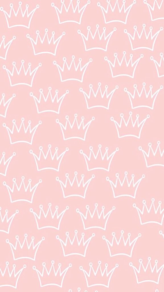 Seamless white crown pattern on pastel pink background elegant playful wallpaper backdrop