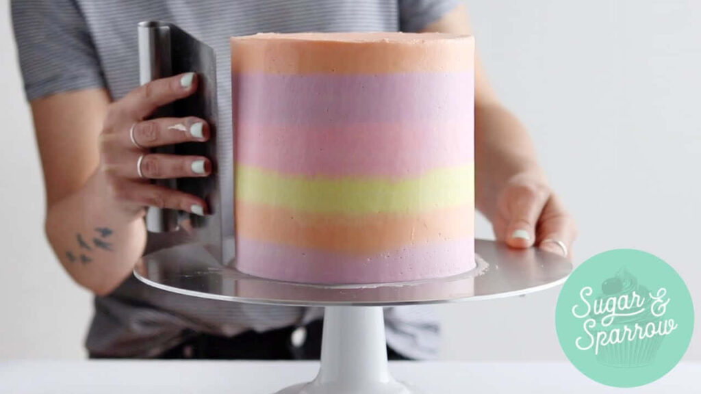 Pastel Striped Cake Detail: Baker Finishing Smooth Icing Wallpaper