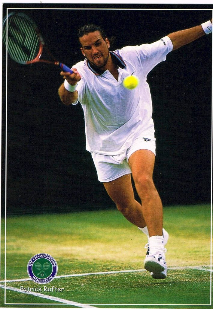 Patrick Rafter powerful forehand Wimbledon action shot tennis legend in white kit wallpaper