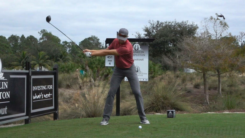 Patrick Rodgers Mid-Swing: Capturing Golf Form & Scenic Backdrop Wallpaper