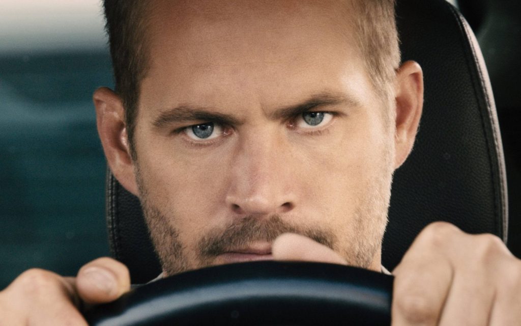 Paul Walker as Brian O'Conner focused behind the wheel Fast and Furious wallpaper high-res
