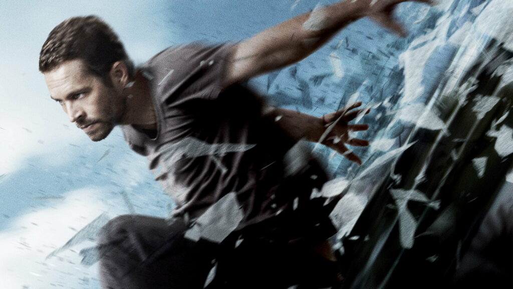 The Late Paul Walker: Action-packed Thrills in Brick Mansions Wallpaper