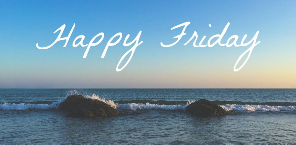 Peaceful Happy Friday seashore wallpaper with dark rocks and golden ocean sunrise background