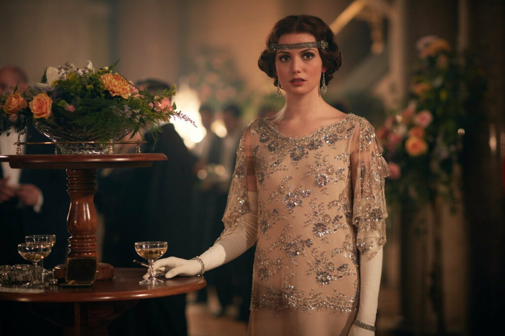 Gaite Jansen in 1920s flapper gown with gloves and headband in Peaky Blinders ballroom scene Wallpaper