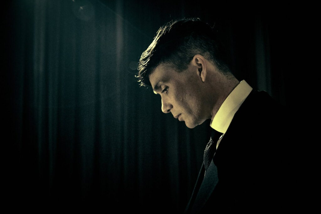 Thomas Shelby cinematic HD wallpaper featuring Cillian Murphy moody silhouette and dramatic lighting