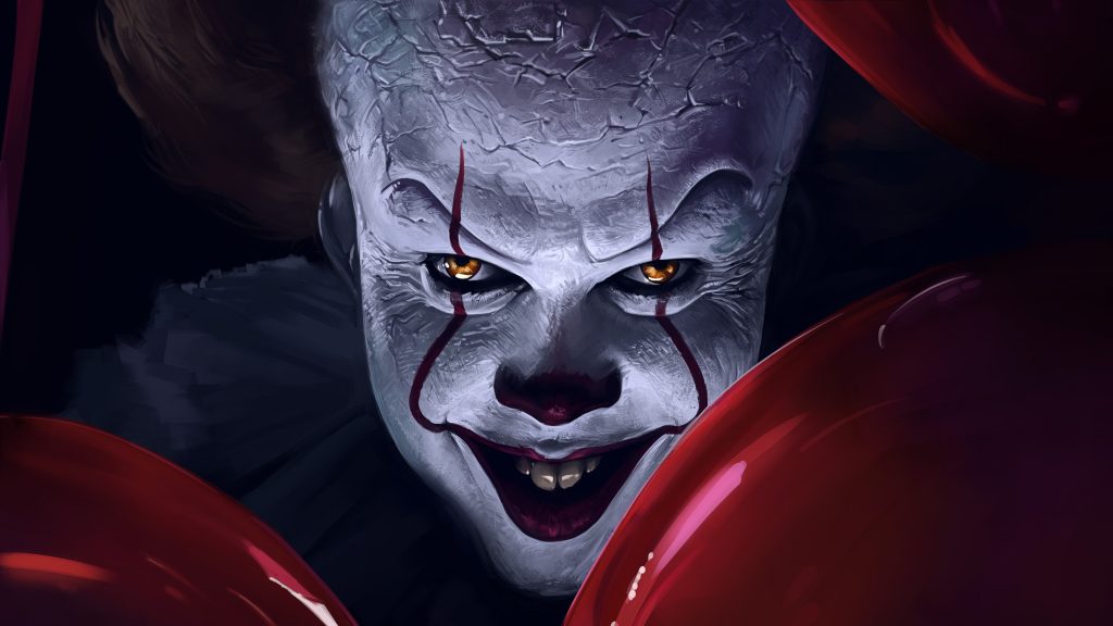 Close-up digital art of Pennywise clown with cracked makeup red balloons horror wallpaper background