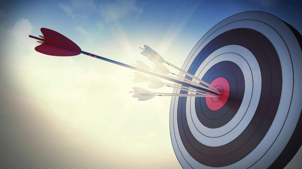Sharpshooter's Paradise: Bullseye Shooting Target Wallpaper with a Shower of Arrows and Darts