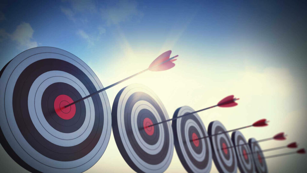 Bullseye Bliss: Stunning Shooting Target Artwork Wallpaper with Perfectly Aimed Arrows on Bright Background