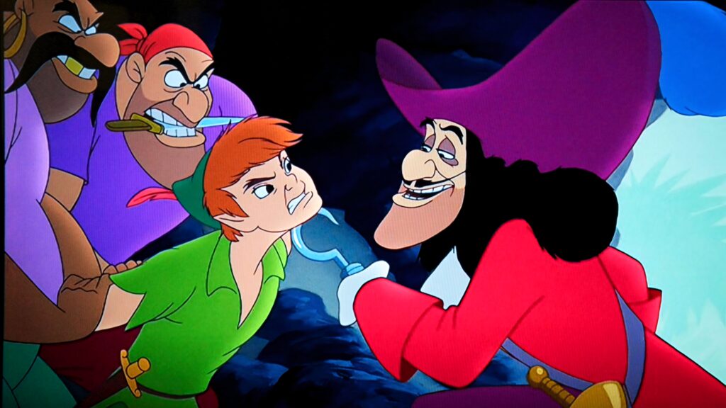 Peter Pan in green confronts Captain Hook in red coat with two pirate crew in cartoon style wallpaper