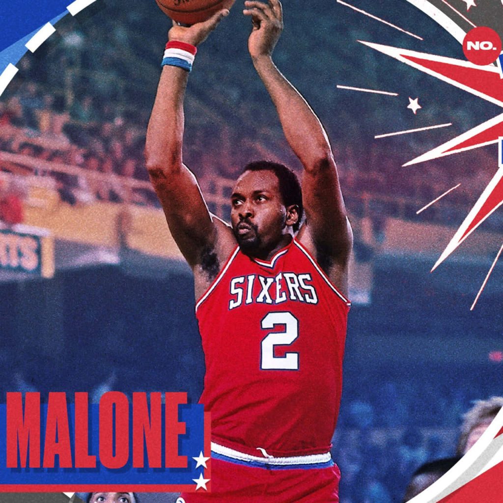 Philadelphia 76ers Moses Malone shooting in red jersey poster style basketball wallpaper background