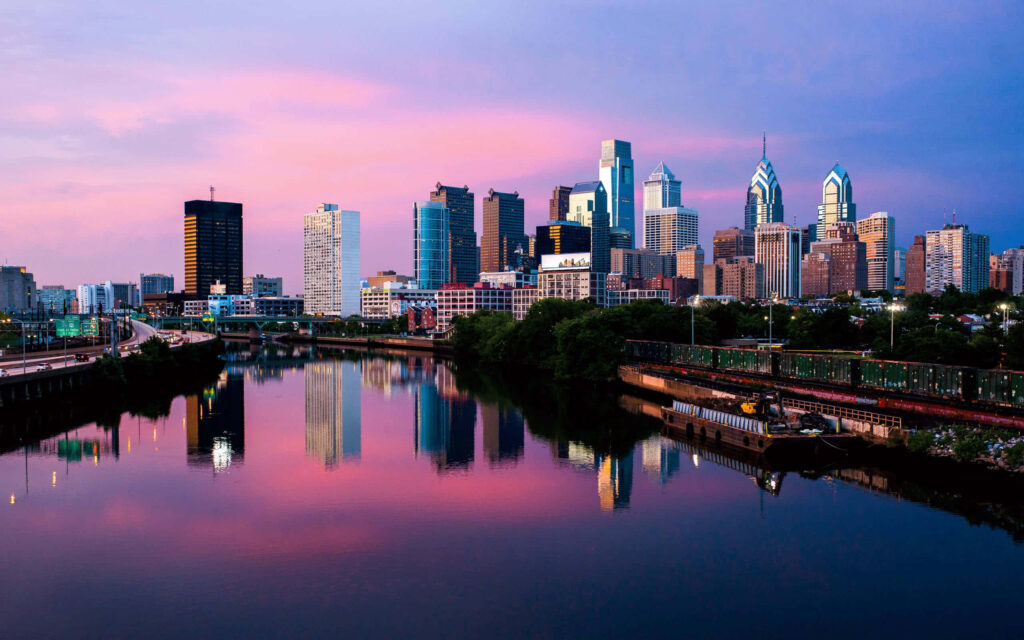 Philadelphia Skyline Wallpaper: Sunset Reflection Over Calm River