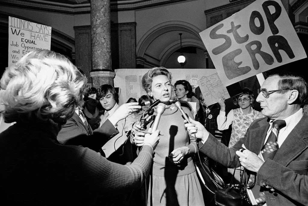 Phyllis Schlafly speaking to reporters Stop ERA campaign 1970s political protest activism Wallpaper