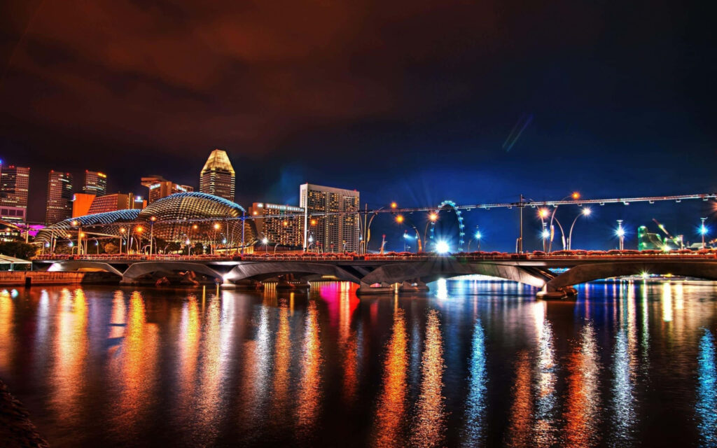Vibrant City Lights Reflection: Stunning Bridge Wallpaper Background