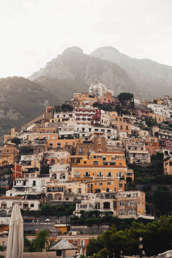 Picturesque Hillside Cityscape Wallpaper with Colorful Architecture