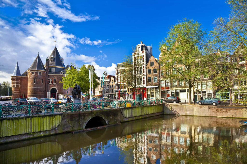 Picturesque Netherlands Countryside: Serene Canals & Historic Charm Wallpaper