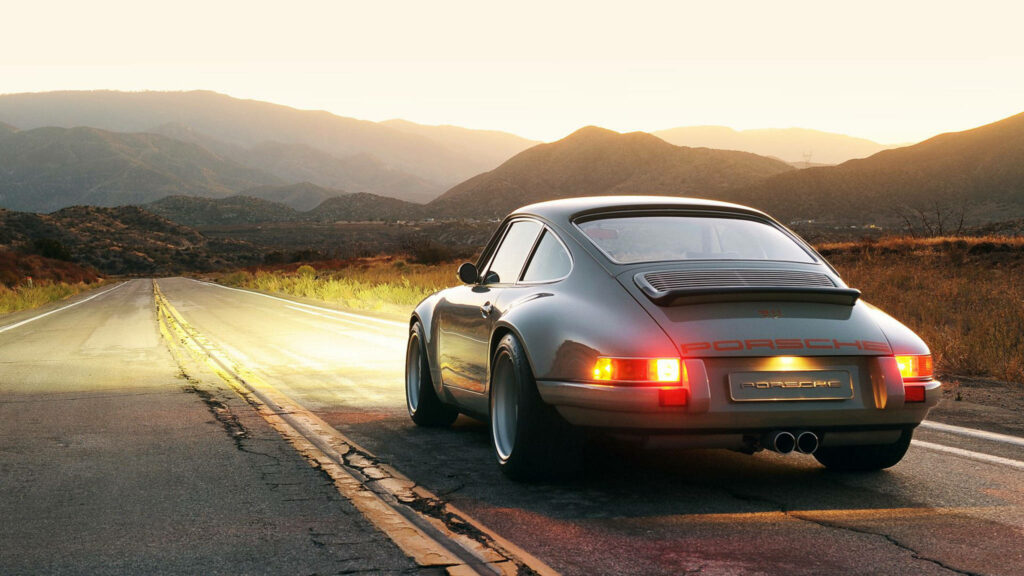 Piercing Power: A High-Resolution Glimpse into the Iconic Design of Singer Porsche 911 Wallpaper