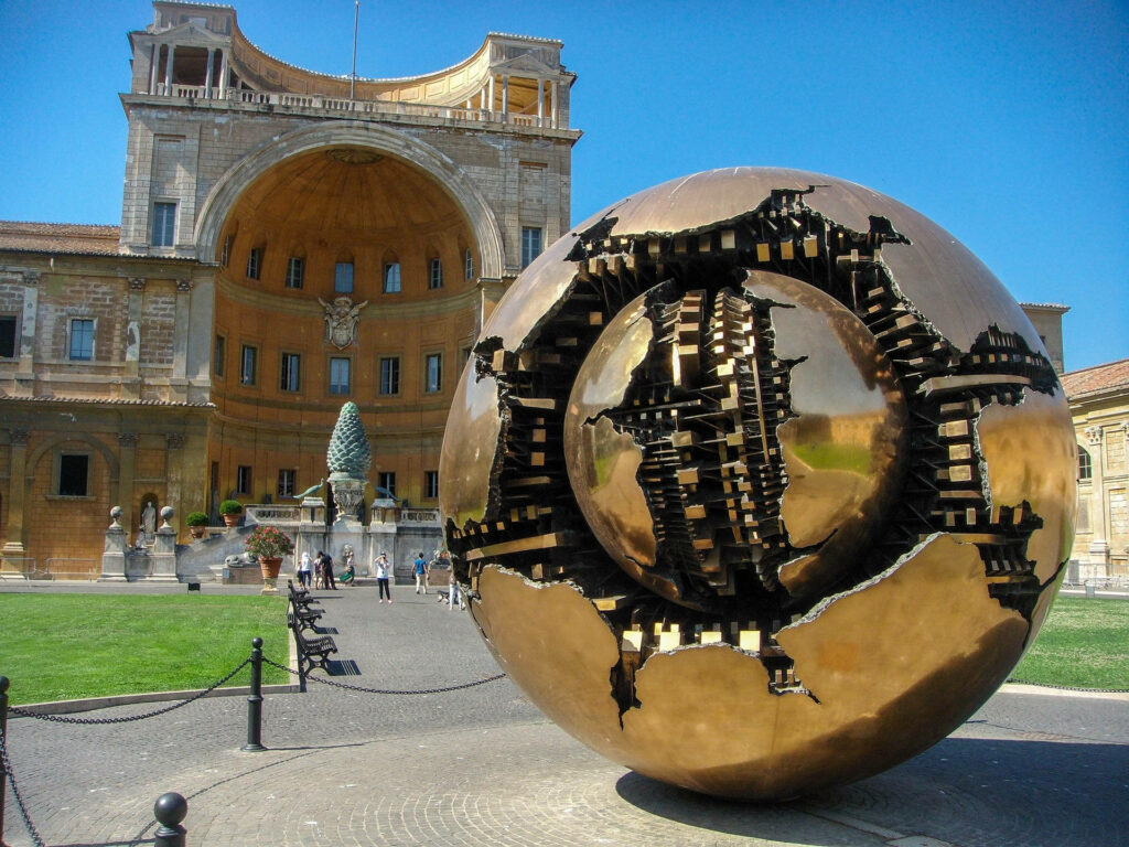 Stunning Pigna Courtyard Wallpaper: Sphere Within Sphere & Pinecone