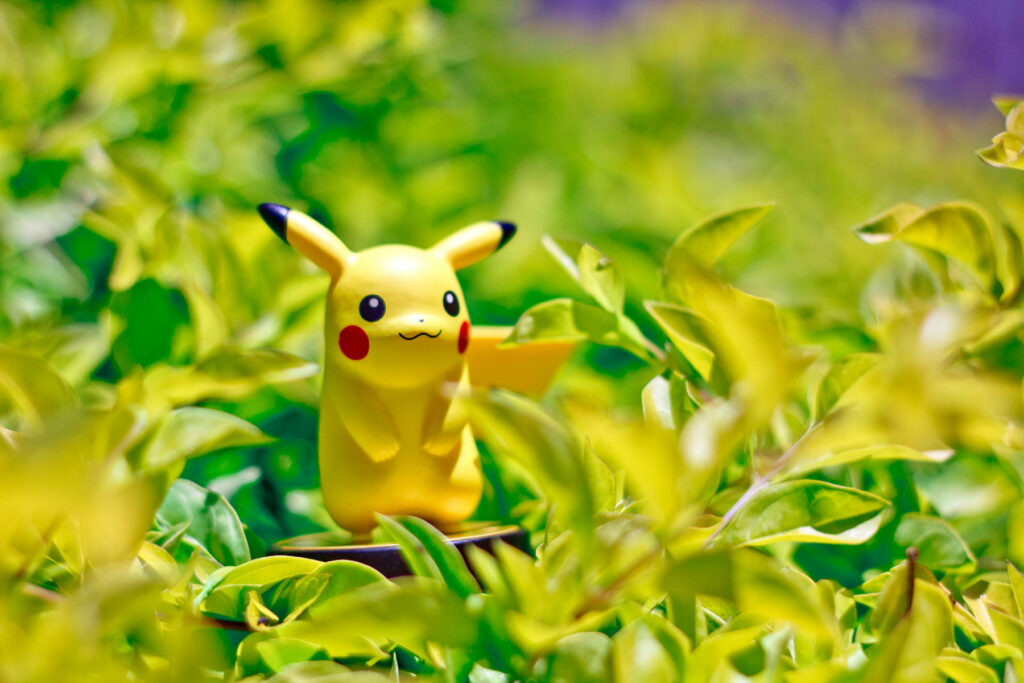 Pikachu's Picture-Perfect Paradise: A Lively 3D Wallpaper Showcasing the Iconic Pokémon on a Vivid Green Meadow