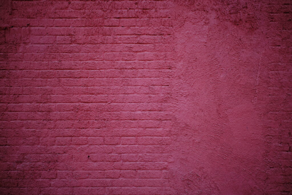 Pink Brick Wall: A Vibrant 5K Wallpaper Background Image
