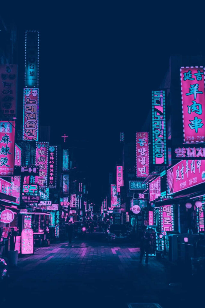 Glimmers of Neon in the Enchanting Pink City Street Wallpaper