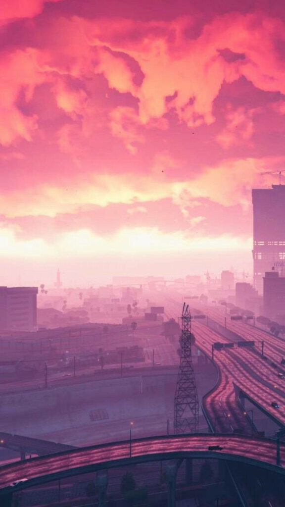 Pink Horizon: Glimpses of the Vibrant Cityscape in GTA 5's Stunning Sky Wallpaper
