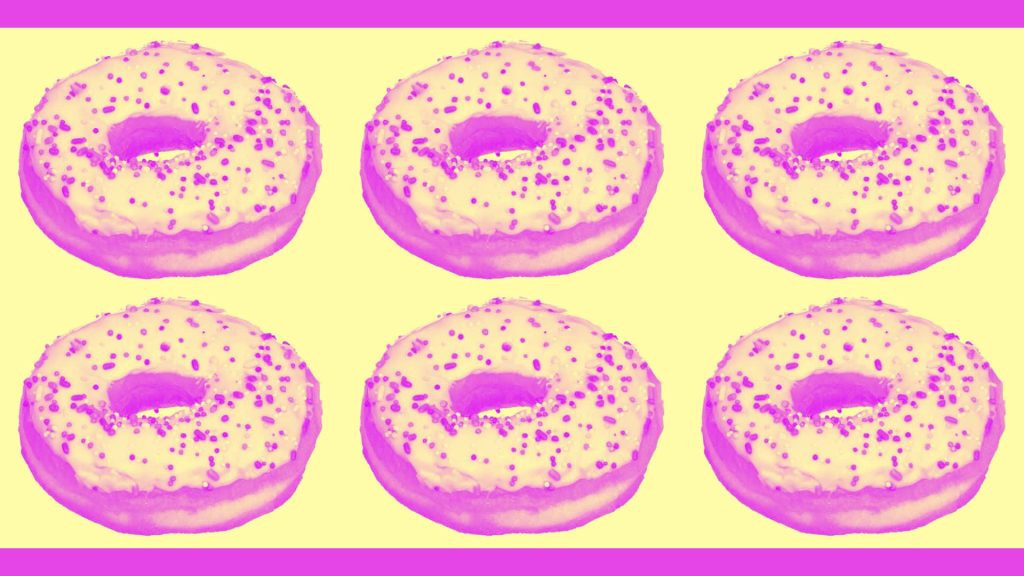 Pop art style vibrant pink sprinkled donuts pattern on soft yellow background wallpaper design