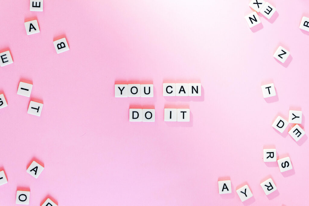 Feminine Inspiration: Empowering Words as Delicate Pastel Wallpaper
