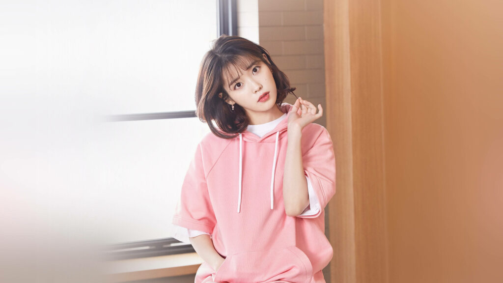 Pretty in Pink: IU's Charming Hoodie Look Wallpaper
