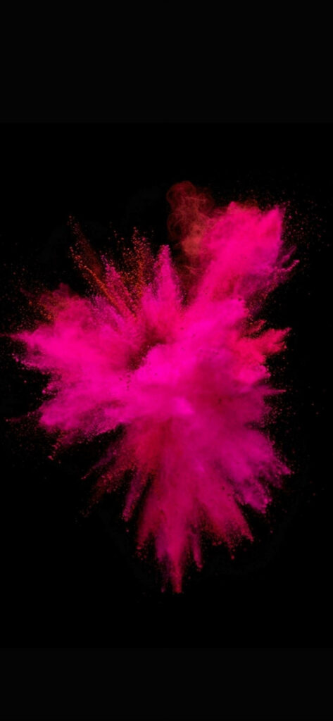 Captivating Pink Powder Burst: Mesmerizing iPhone Wallpaper with Mysterious Dark Backdrop