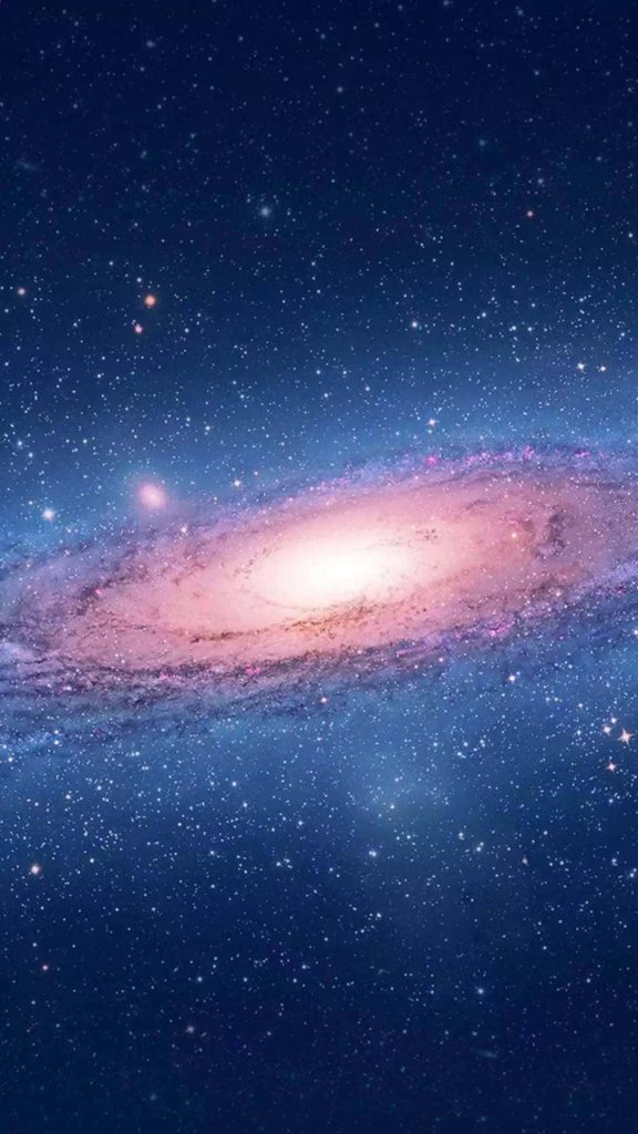 Pink spiral galaxy wallpaper glowing on deep blue starry cosmic background for iPhone