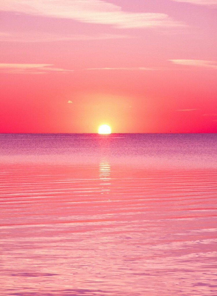 Enchanting Pink Sunset over Majestic Mountains - Phone's Captivating Retina Display Wallpaper