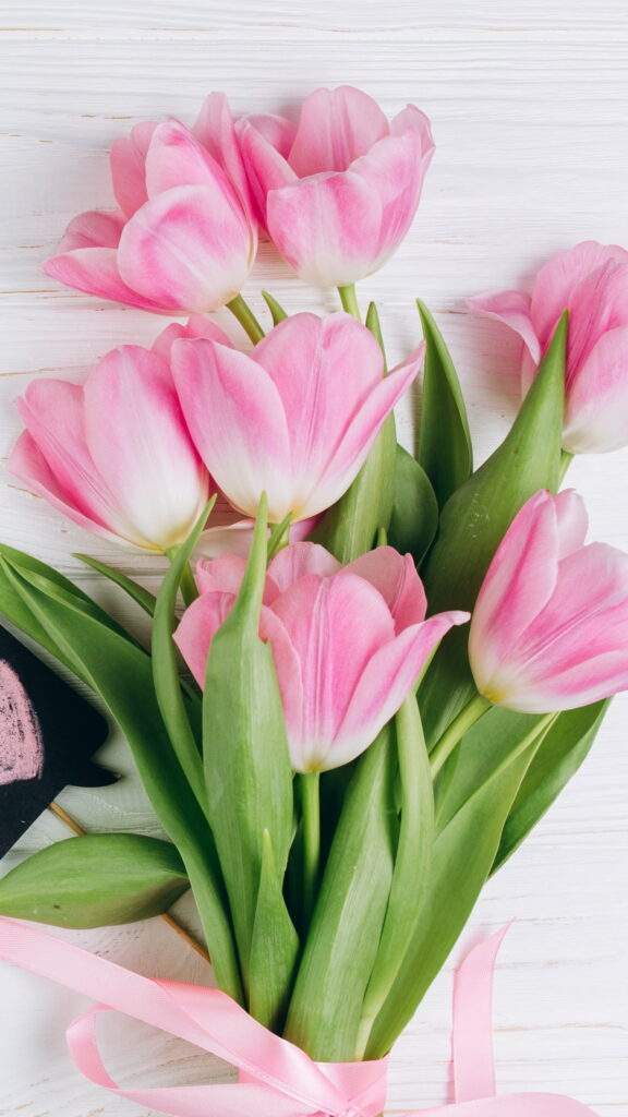 Blooming Beauty: HD Phone Wallpaper of a Pink Tulip Bouquet