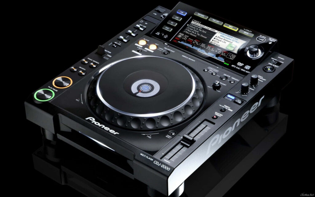 Close-up of Pioneer CDJ-2000 digital turntable with colorful LEDs on black background DJ wallpaper