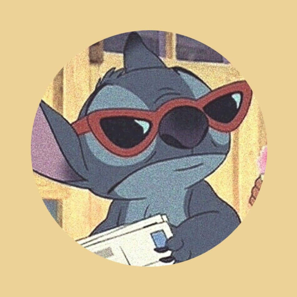 Playful Cartoon Character with Red Sunglasses in Circular Frame Wallpaper