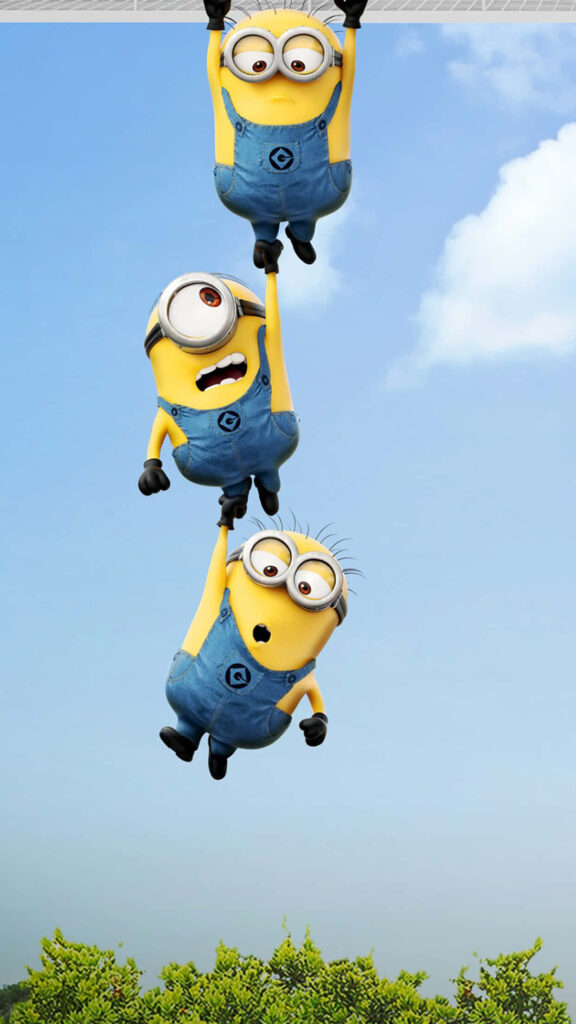 Playful Despicable Me Minion Wallpaper with Chain of Three Above Tree