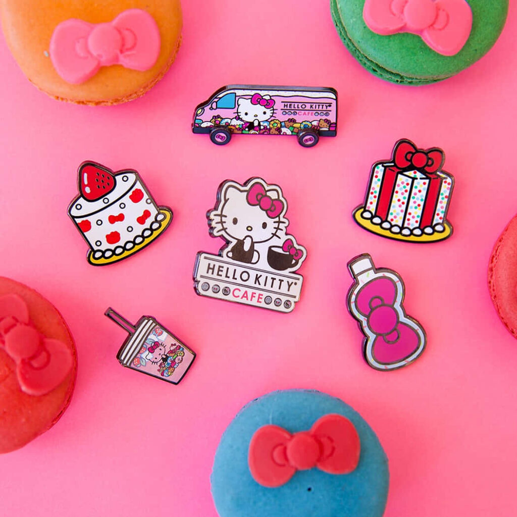Cheerful Hello Kitty Wallpaper: Playful Pins & Colorful Macarons