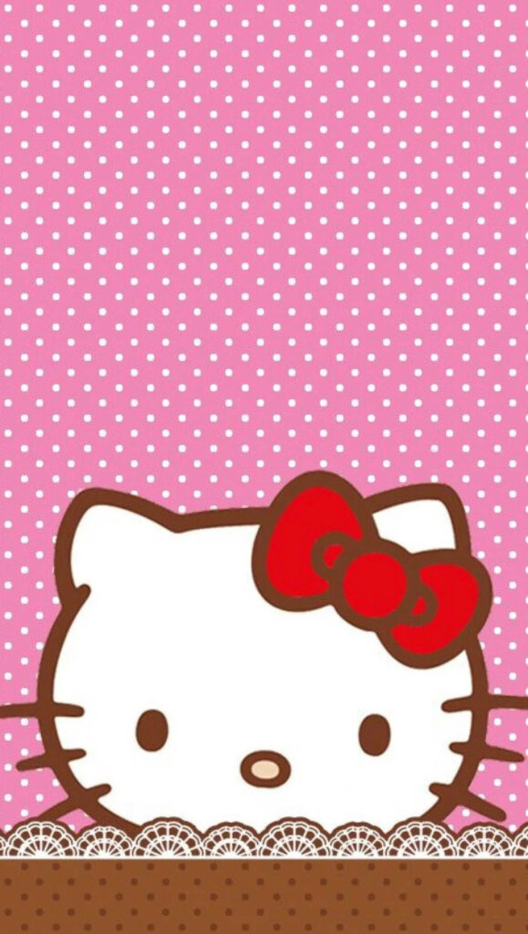 Playful Hello Kitty Wallpaper: Charming Pink Polka Dot Design