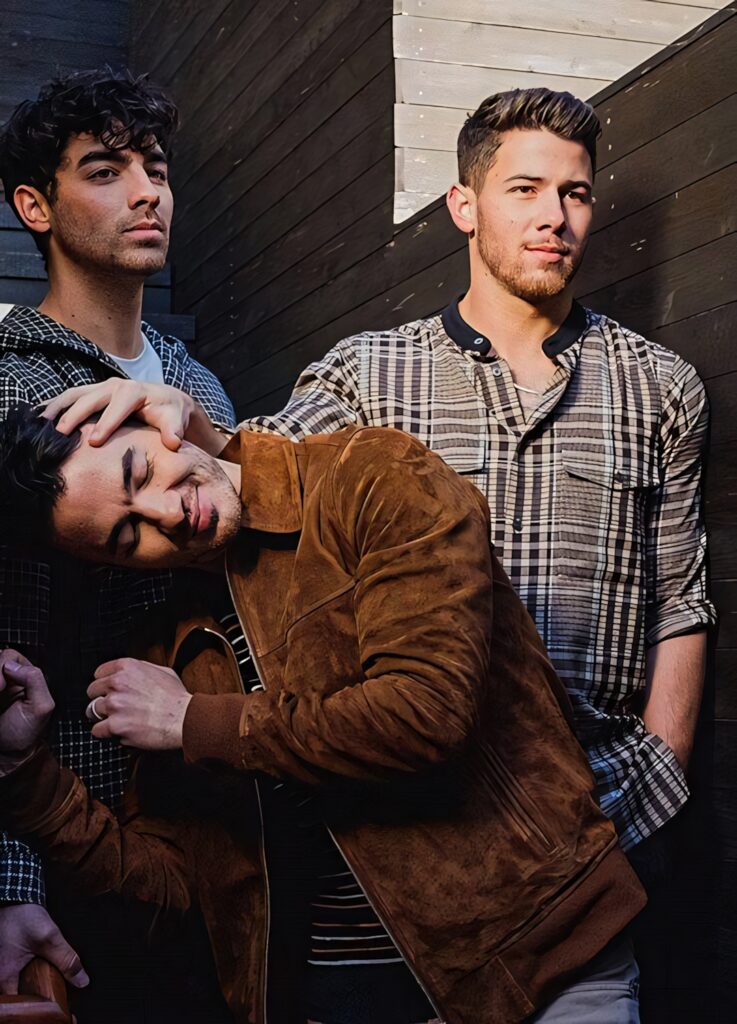 Playful Jonas Brothers Wallpaper: Stylish Casual Vibes & Camaraderie