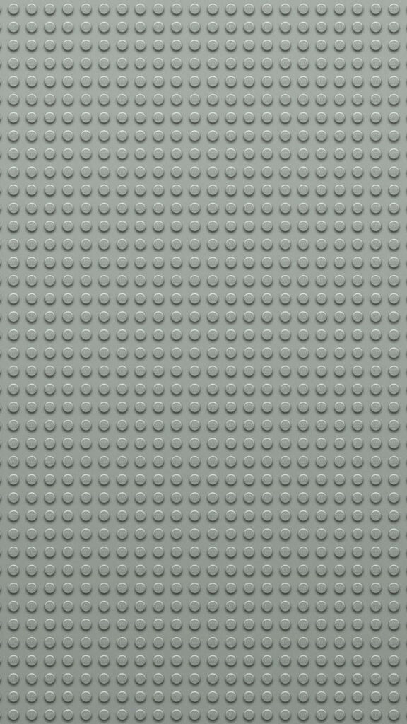 Playful Light Gray Wallpaper with LEGO-Inspired Bump Pattern