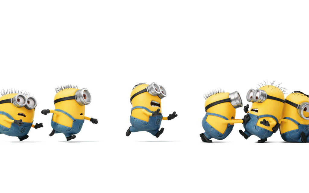Playful Minions Running Wallpaper for a Lively Desktop Background