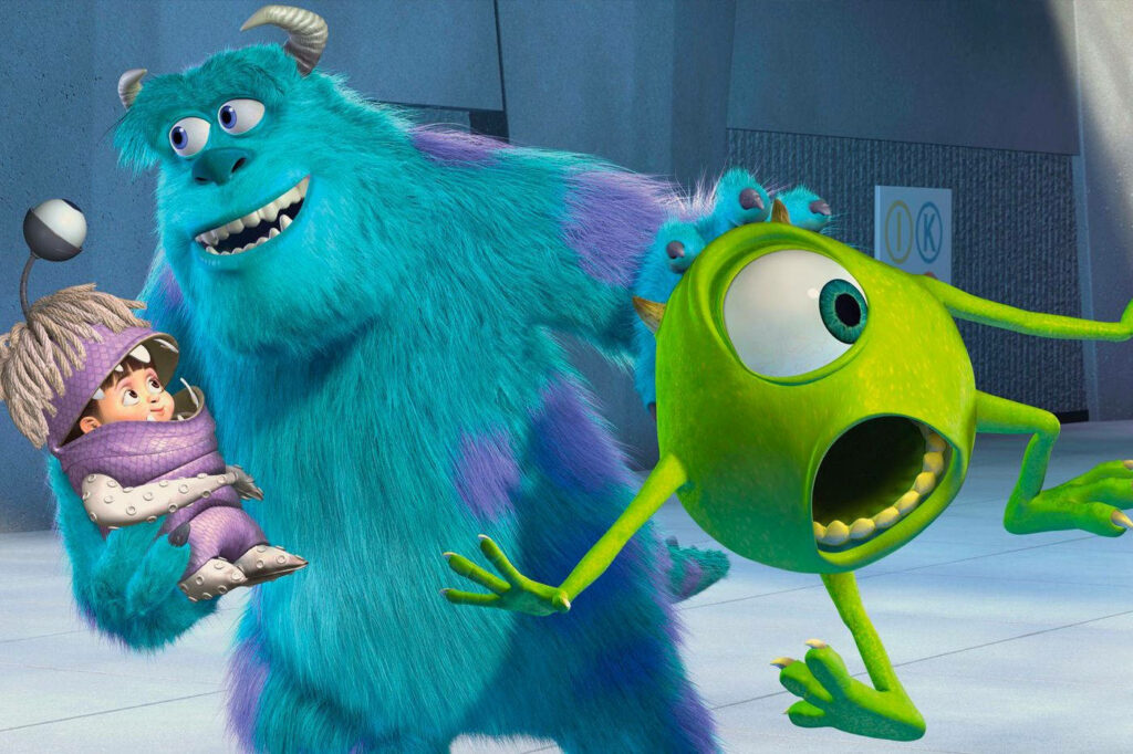 Colorful Monsters Inc. Wallpaper: Sulley, Boo & Mike's Fun Scene