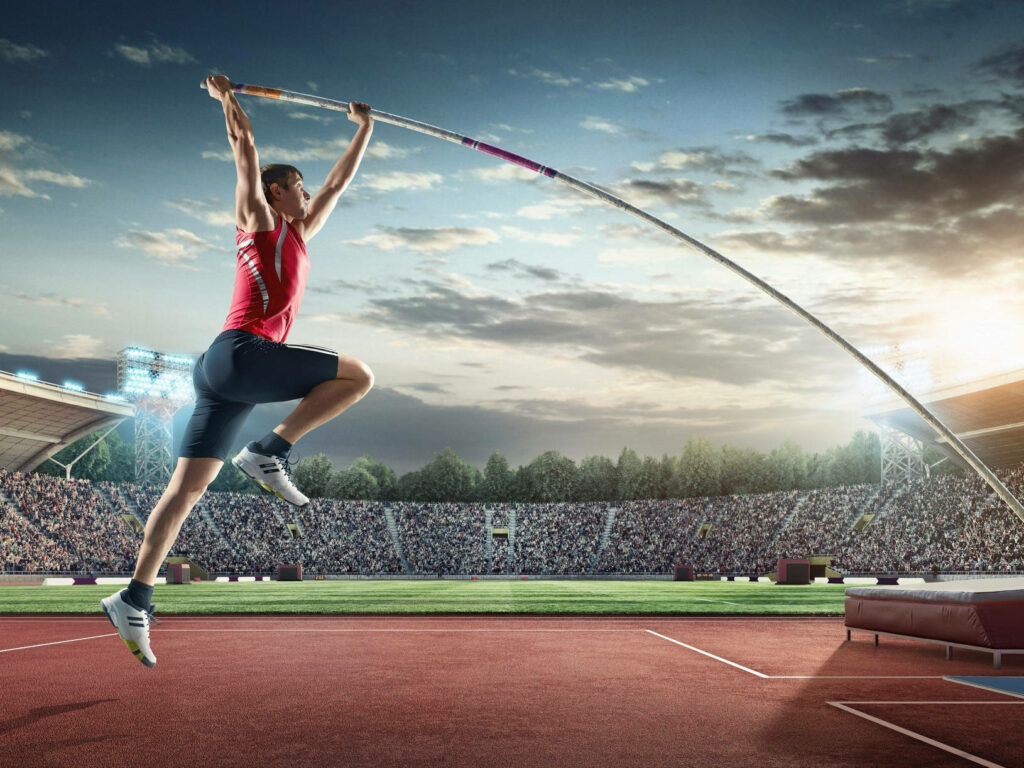 Dynamic Pole Vault at World Athletics Championship: Strength & Precision Wallpaper