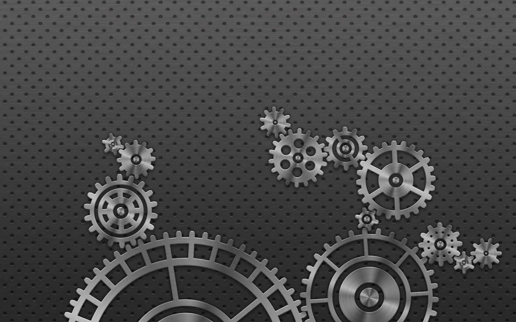 Abstract digital wallpaper with polished silver gears on dark industrial perforated background