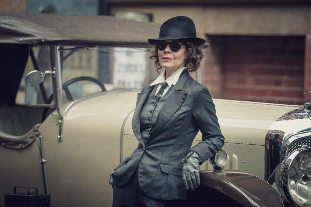 Exuding Elegance: Polly Gray in a Classy Grey Suit - Peaky Blinders 8k Background Snapshot Wallpaper