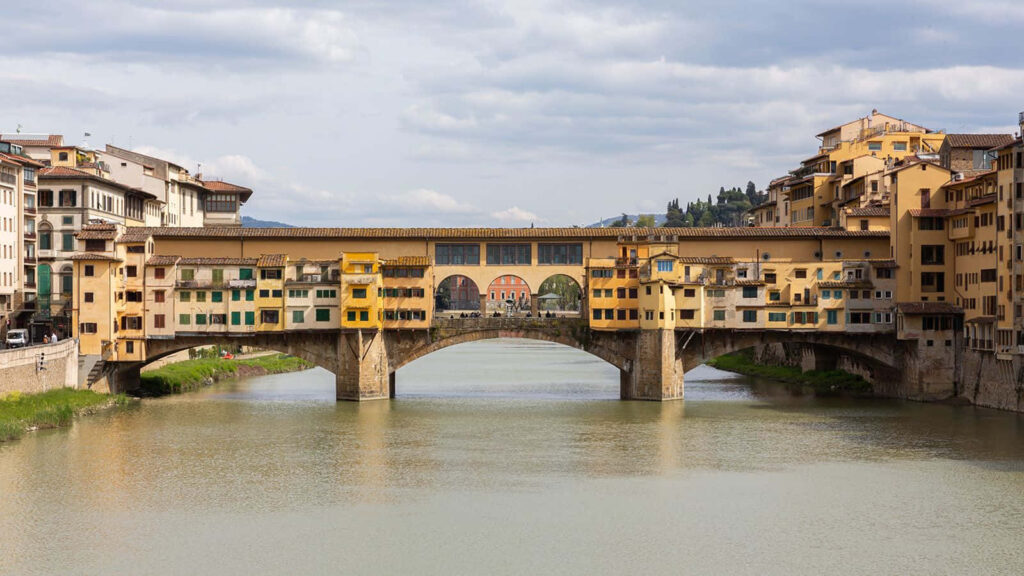 Charming Ponte Vecchio Wallpaper: Iconic Florence Bridge Background