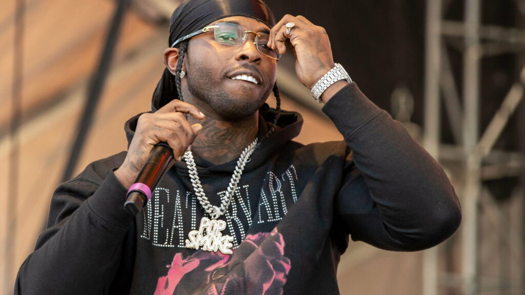 Pop Smoke performing live in black hoodie durag clear glasses diamond pendant concert wallpaper