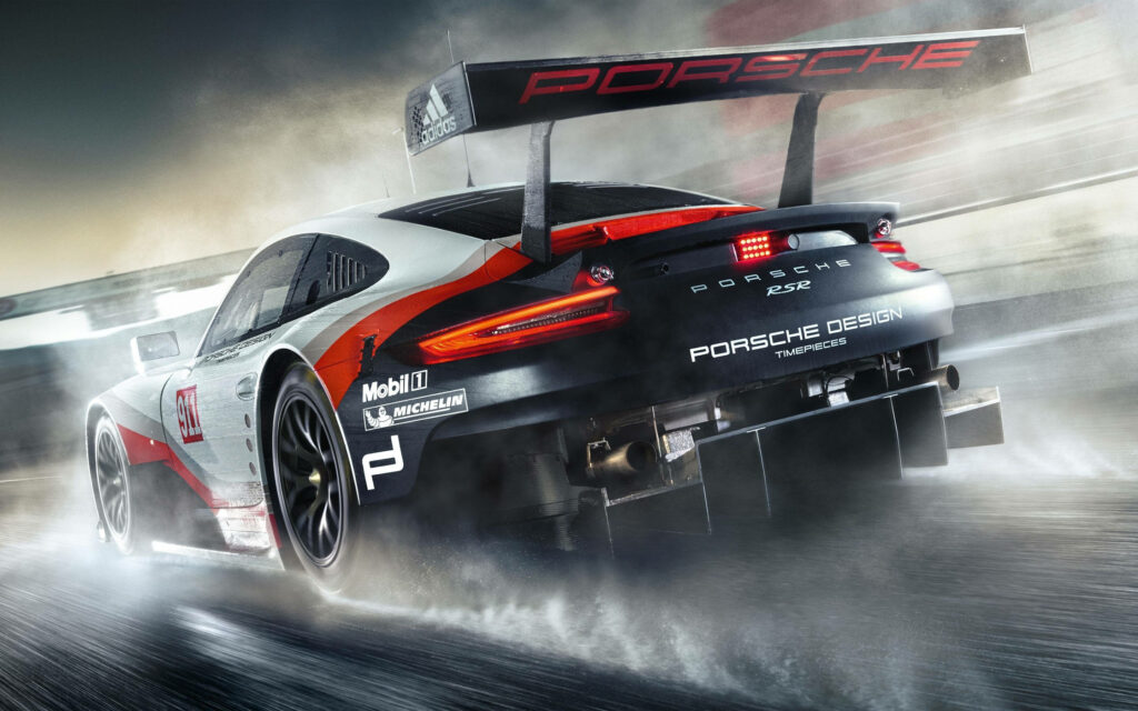 Porsche racing car on track high speed 4k wallpaper aerodynamic spoiler dynamic design
