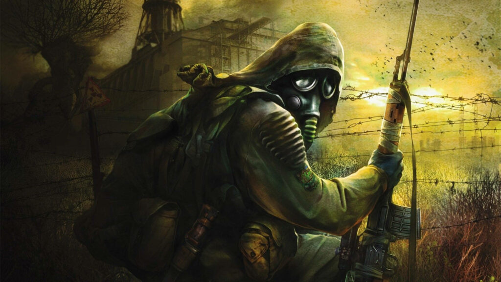 Russian hazmat soldier in gas mask crouching by barbed wire in desolate Chernobyl radioactive zone Wallpaper